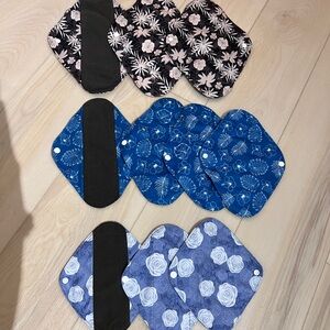 10 piece set of Reusable Pads with bamboo charcoal lining. Sizes: S, M, and L.